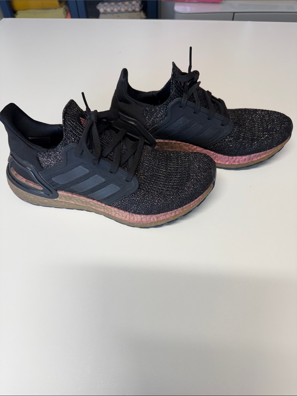 adidas Women’s Black Knit Sneakers with Pink Metallic Midsole